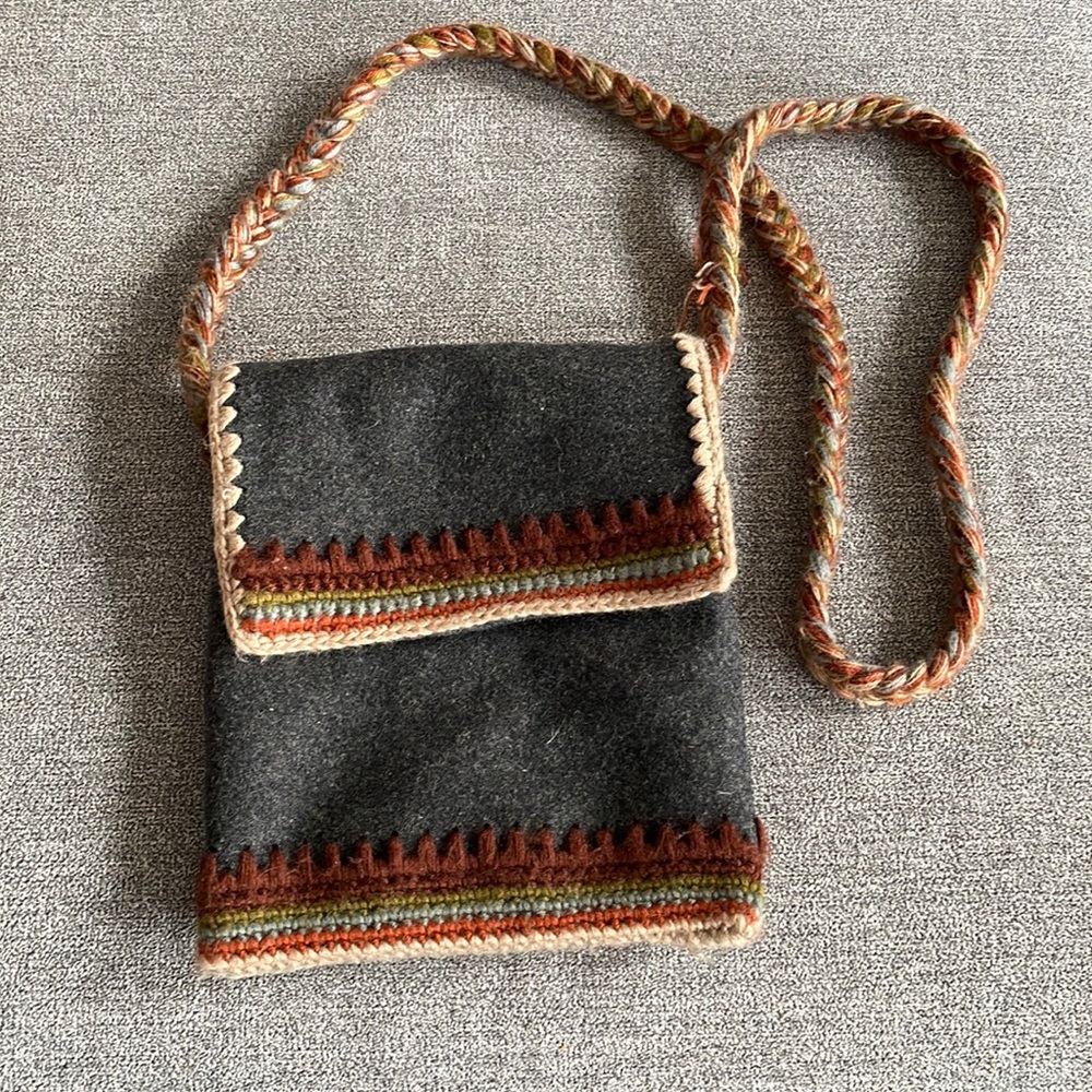 Cute small crossbody bag. Great with knit detail